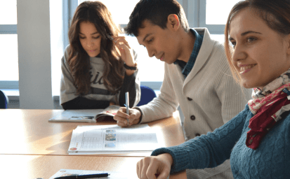Students studying together in a classroom