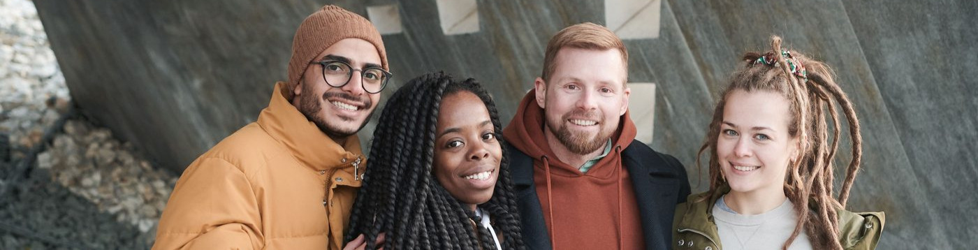cropped version Group of four smiling young people